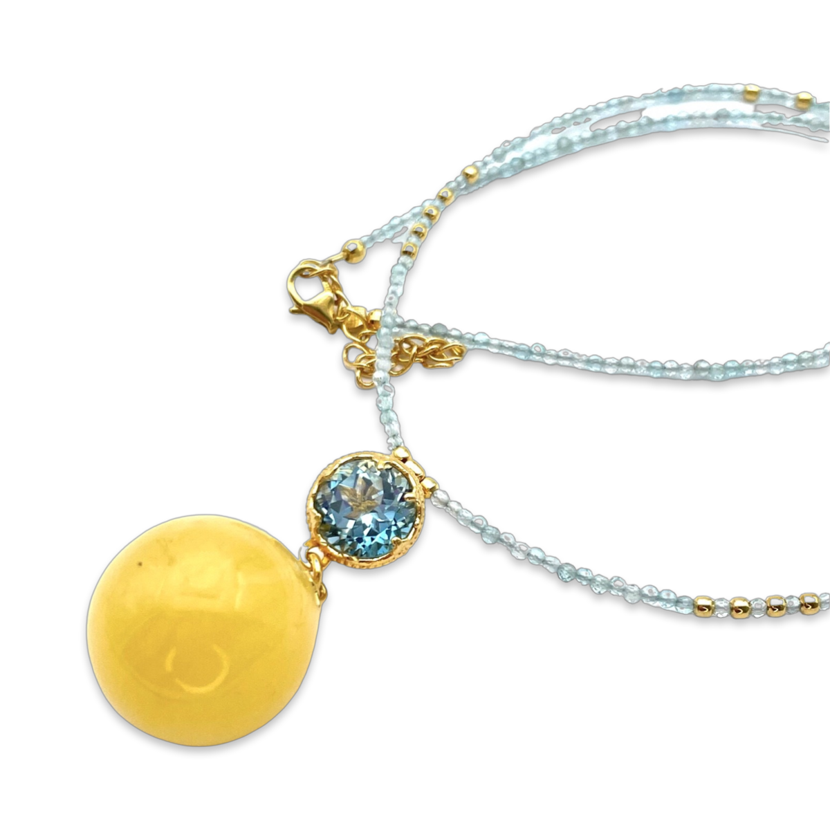 Necklace with amber and topaz