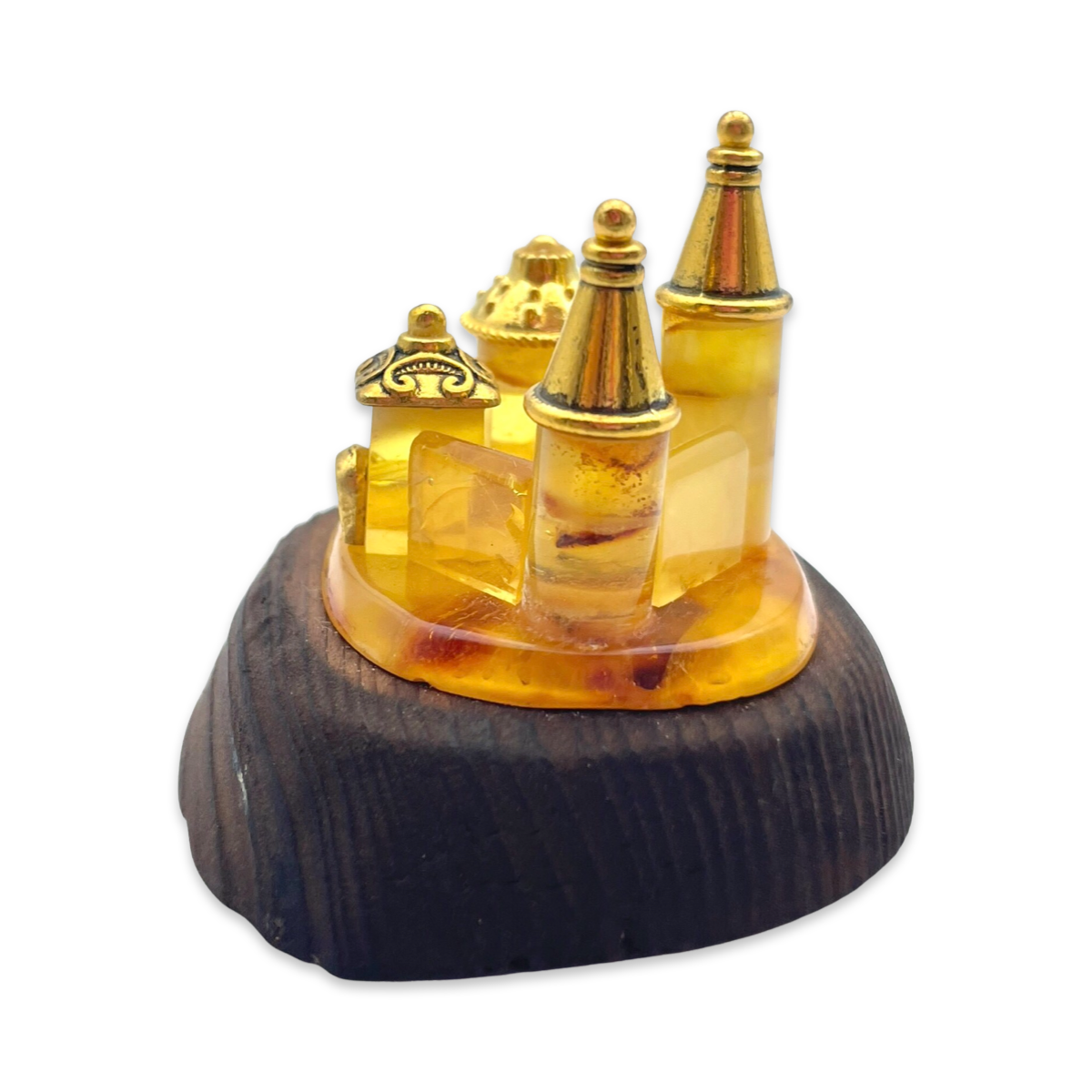 Amber souvenir on a wooden stand