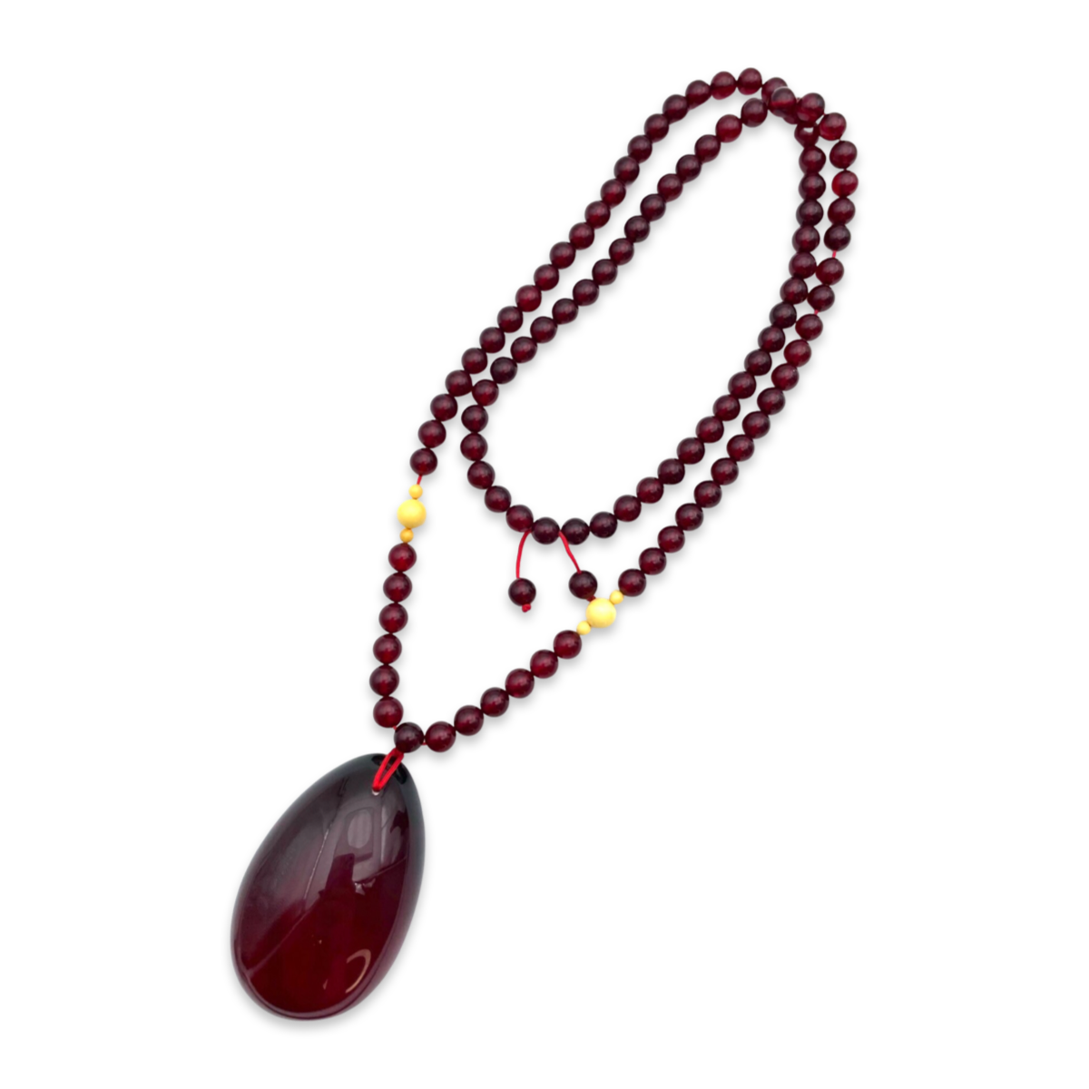 Red amber pendant with lens