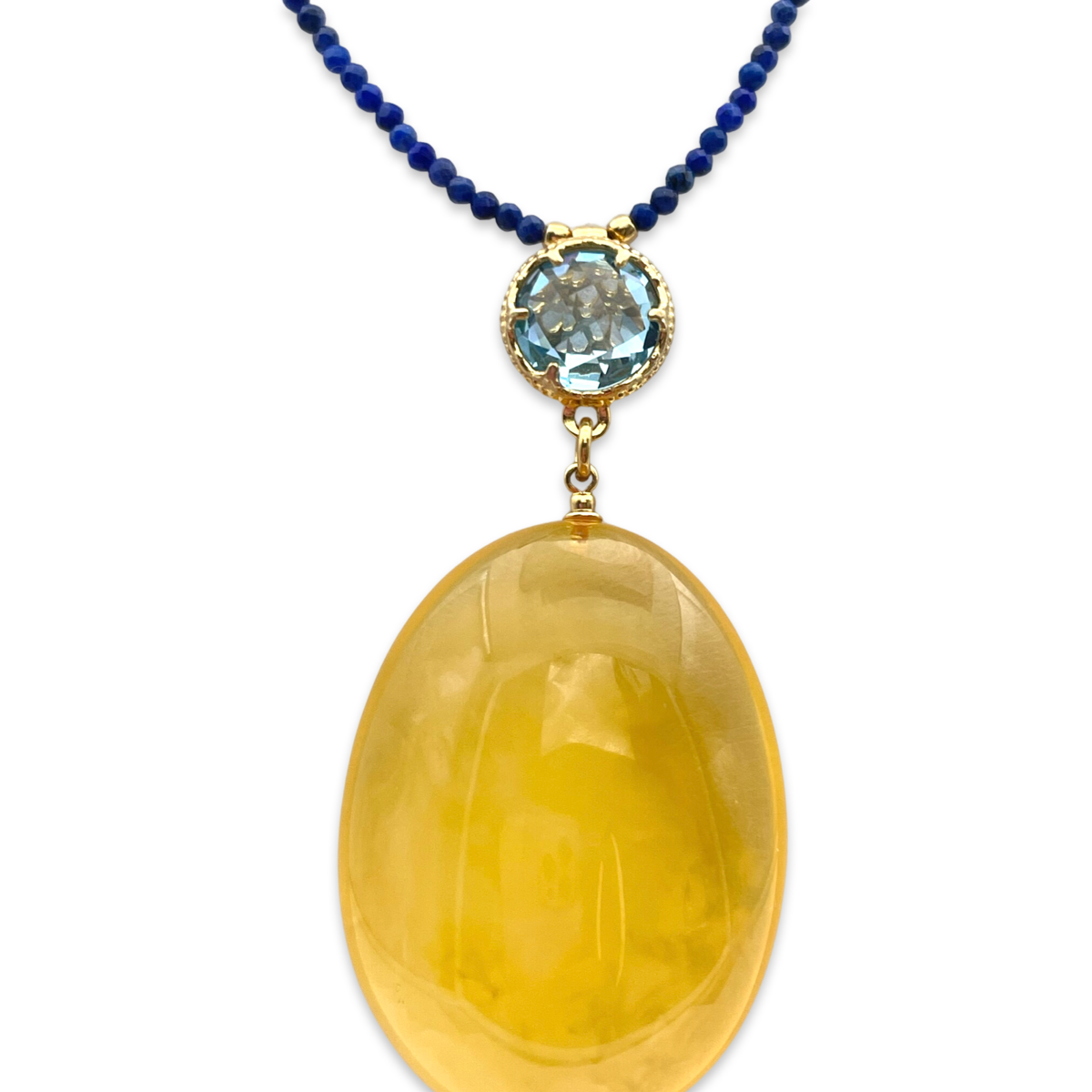 Necklace with amber and topaz