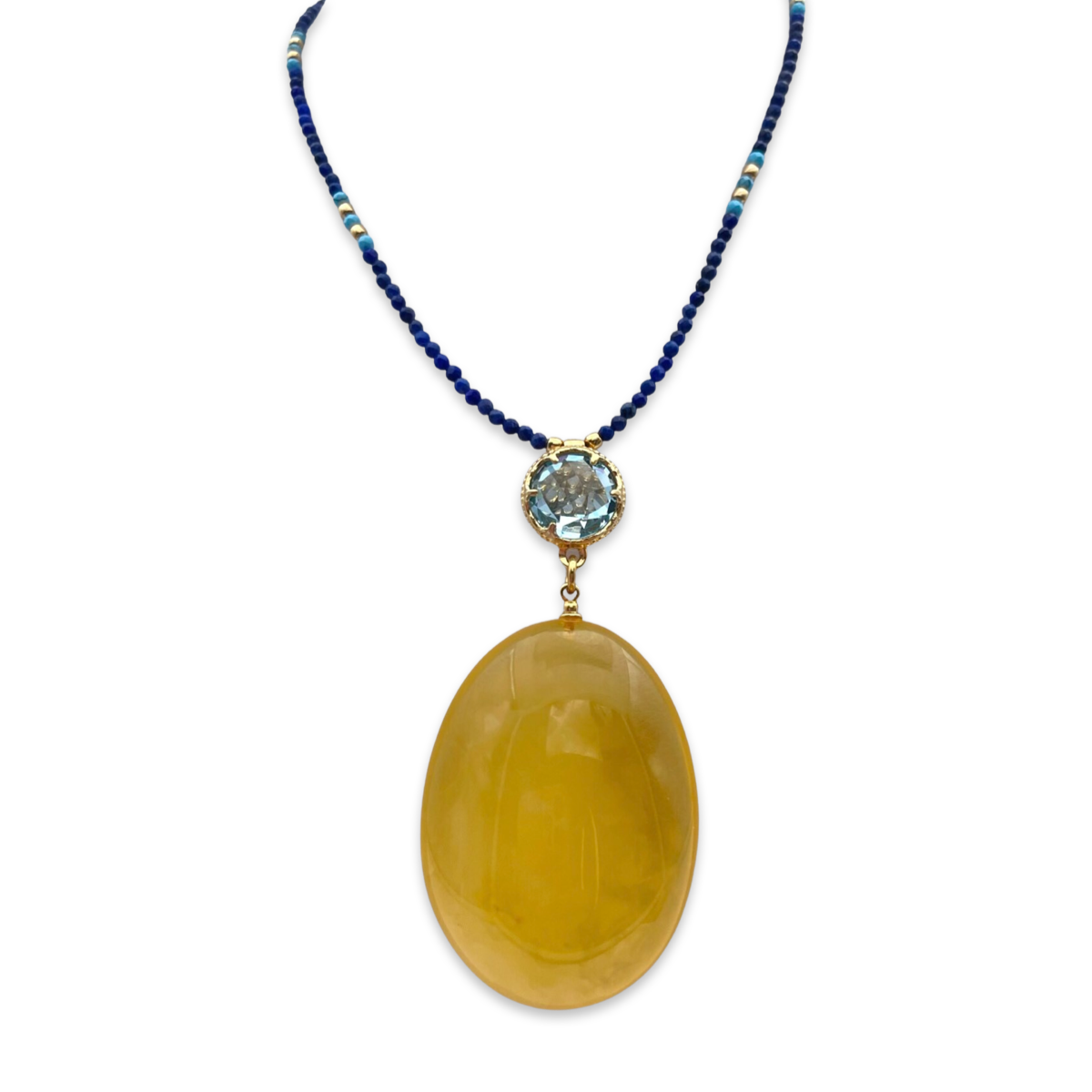 Necklace with amber and topaz