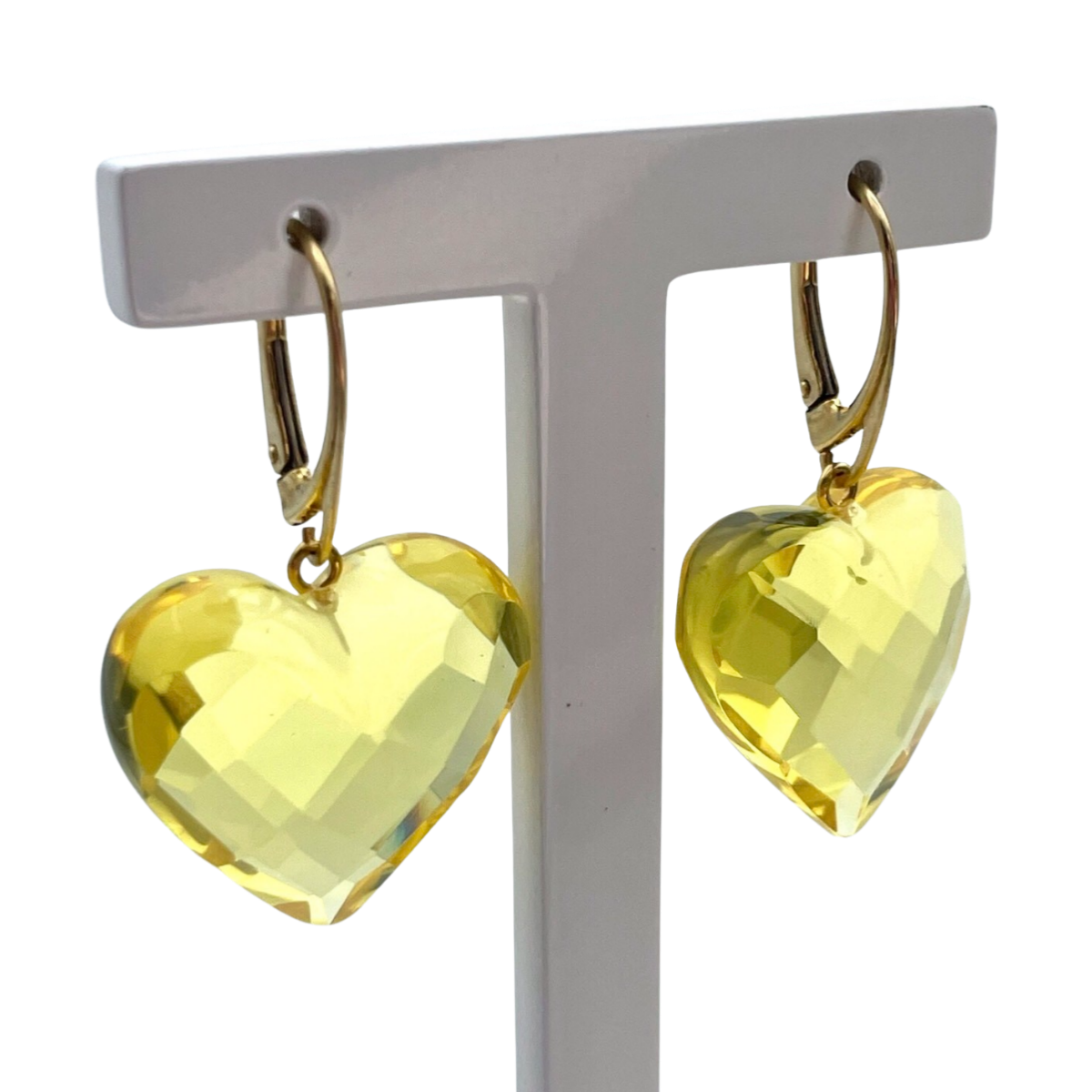 Gilded earrings with faceted amber