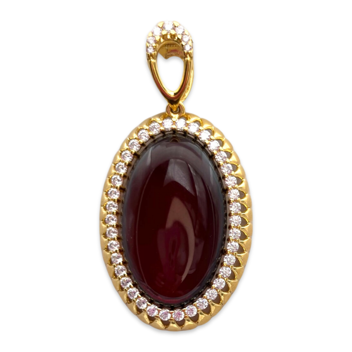 Gold-plated pendant with amber and zircons