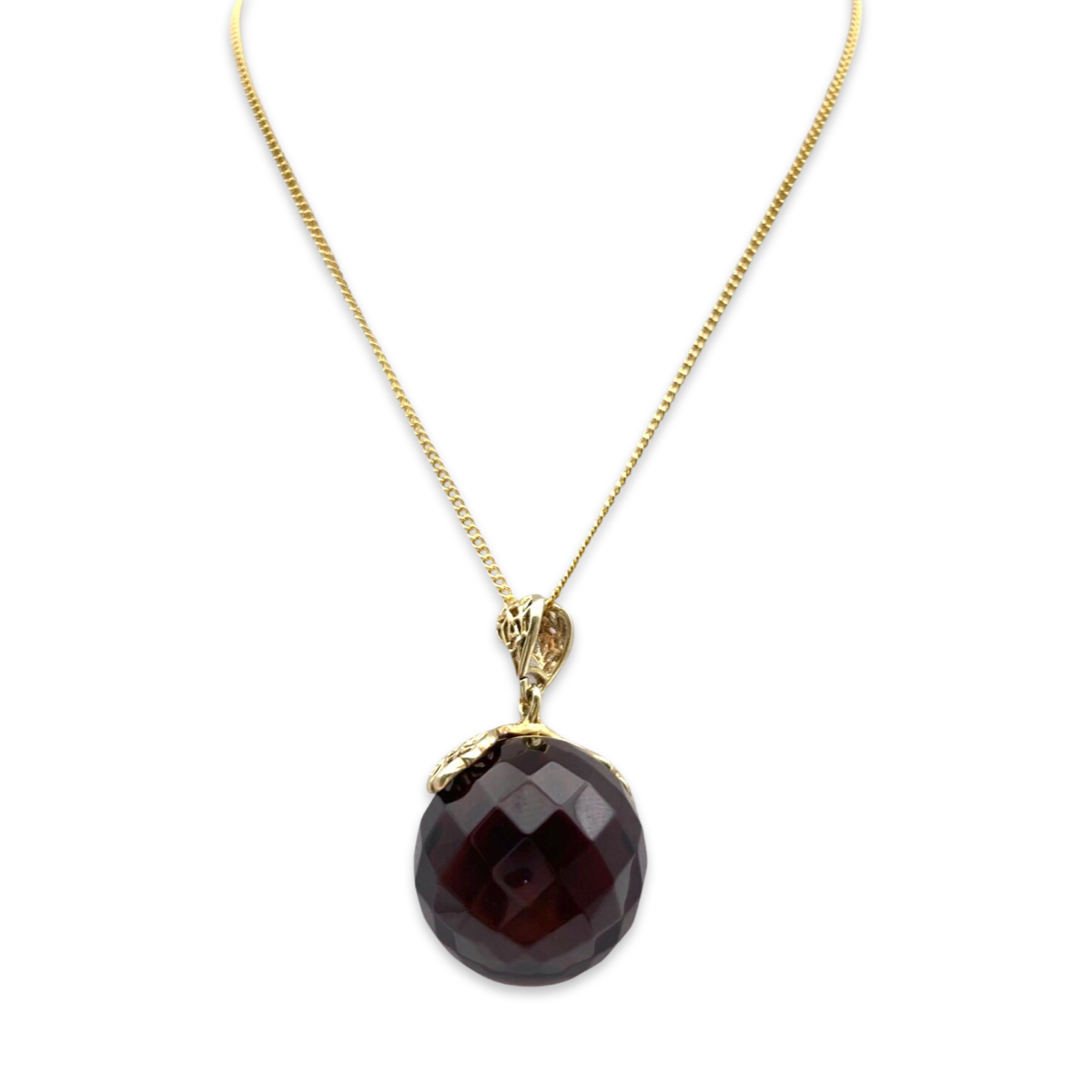 Large amber pendant with gold-plated chain