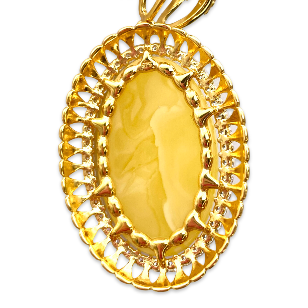 Gold-plated pendant with amber and zircons