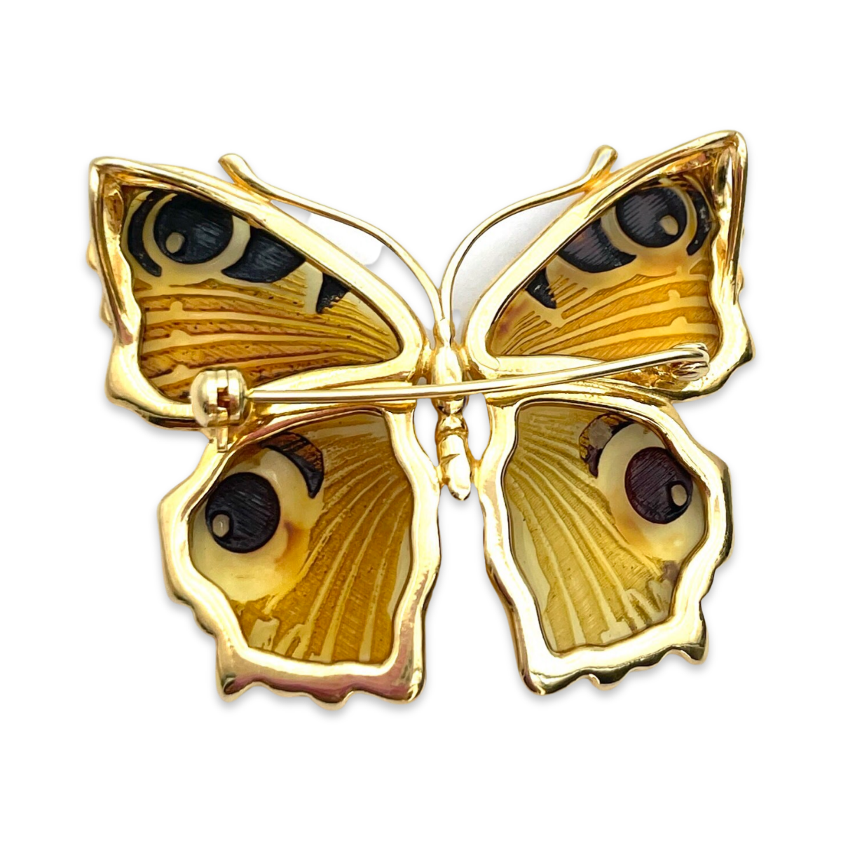 Gilded butterfly brooch with amber