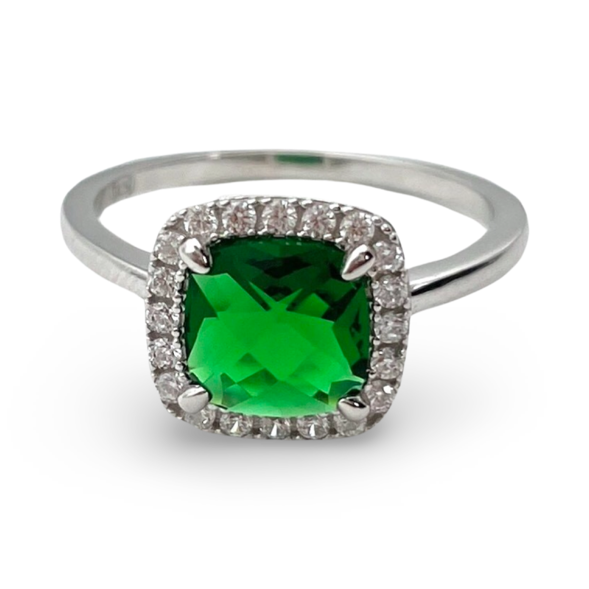 Silver ring with green zircon