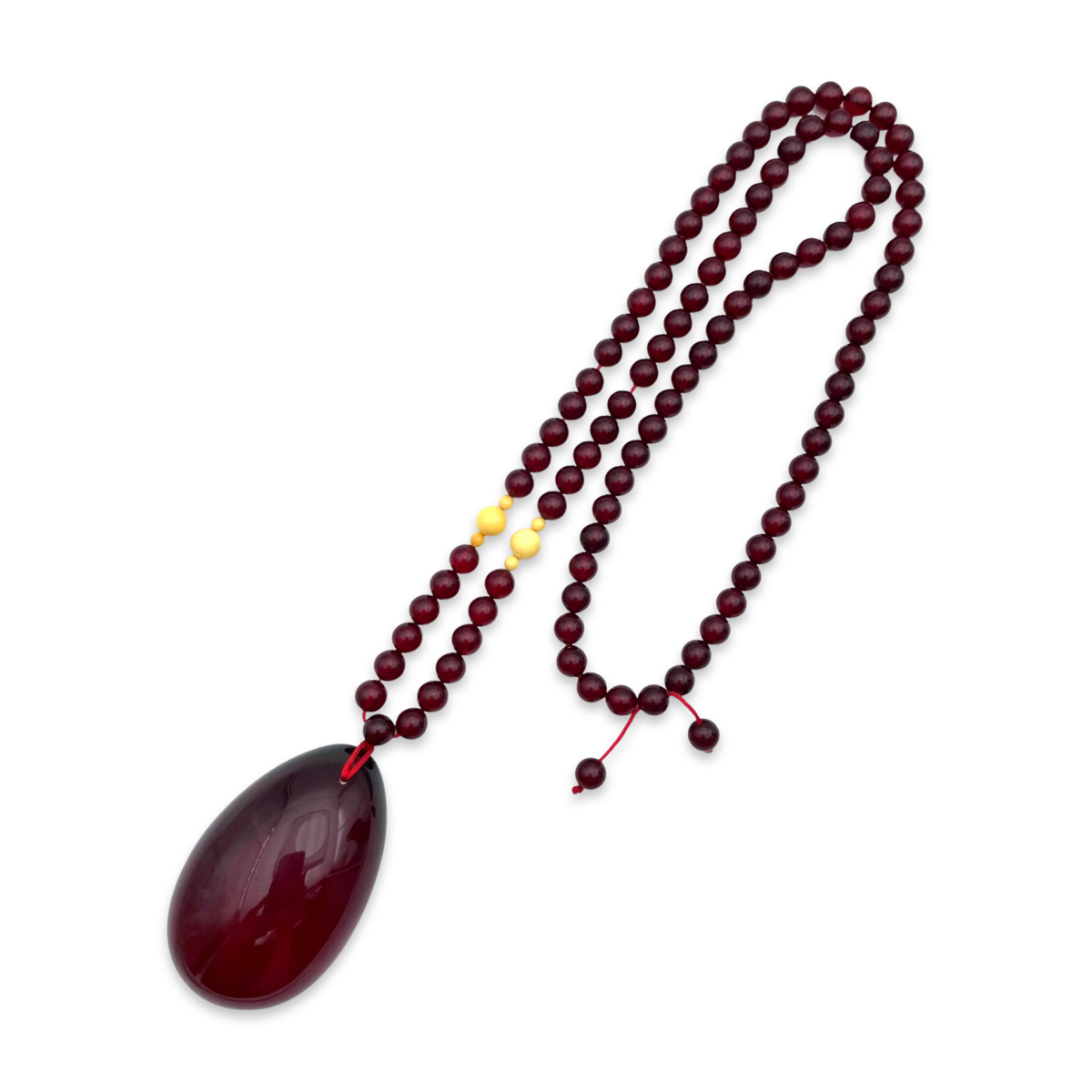 Red amber pendant with lens