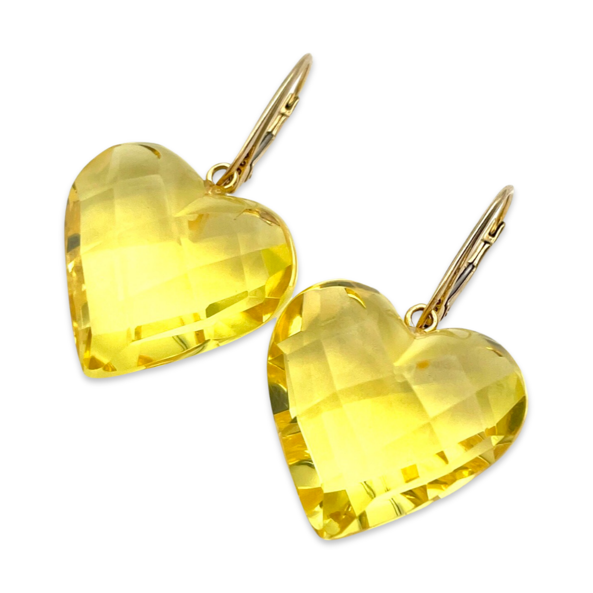 Gilded earrings with faceted amber