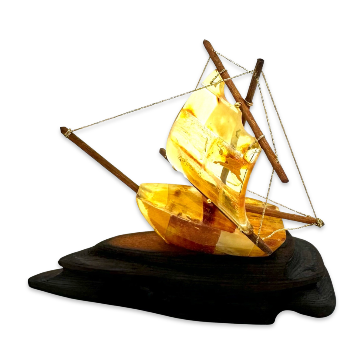 Amber souvenir on a wooden stand «Ship»