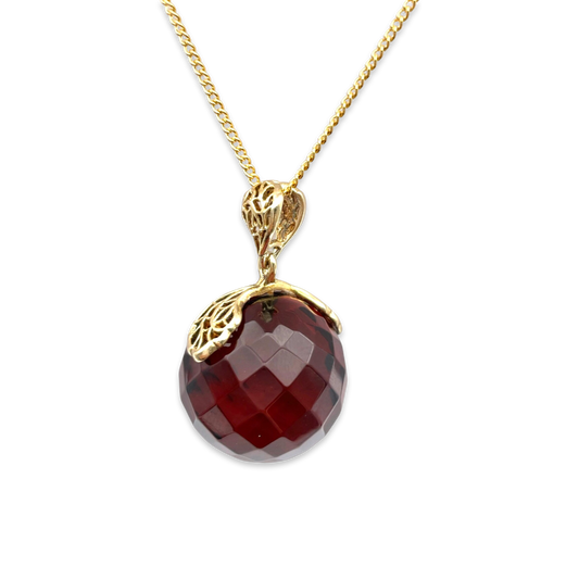 Large amber pendant with gold-plated chain