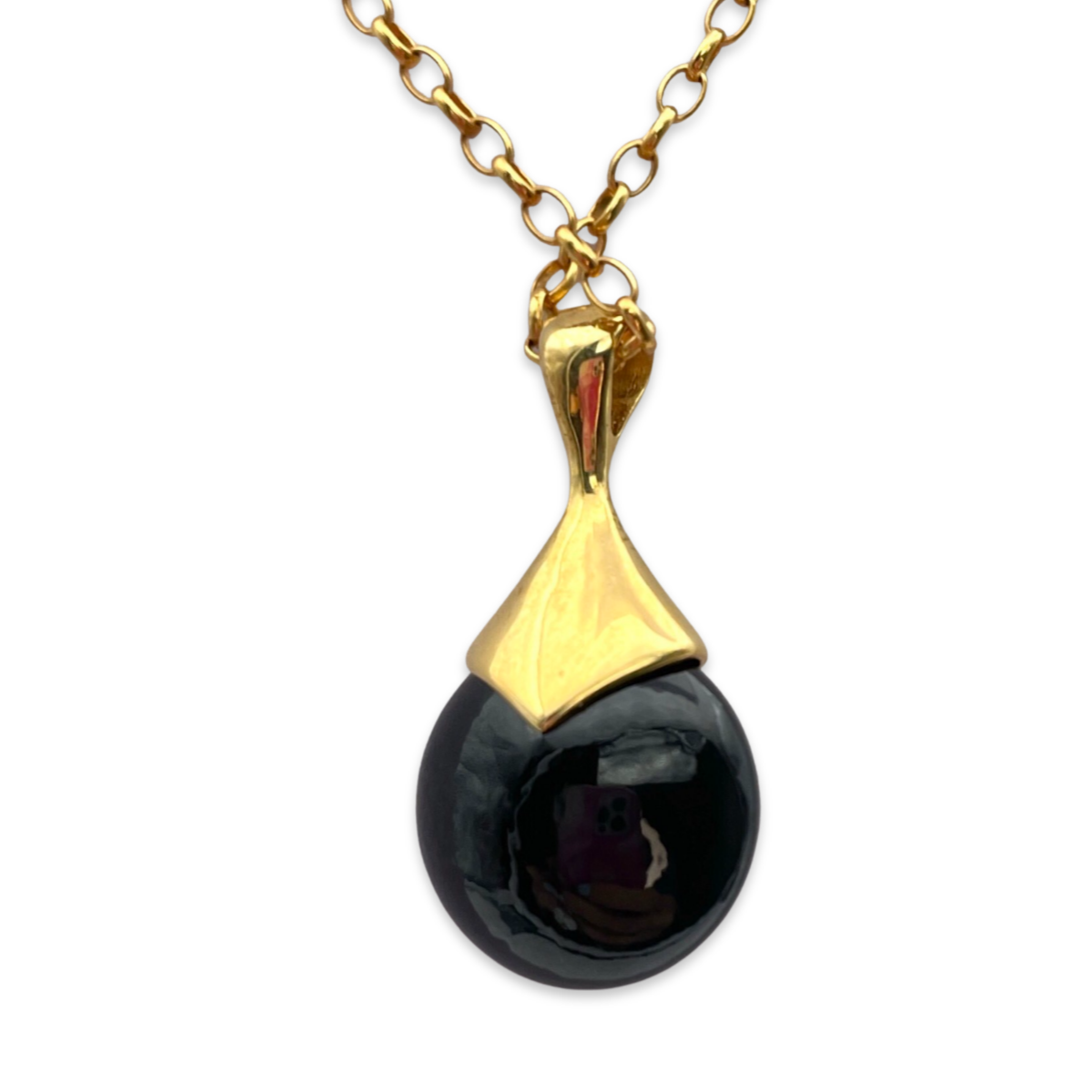 Gilded amber pendant