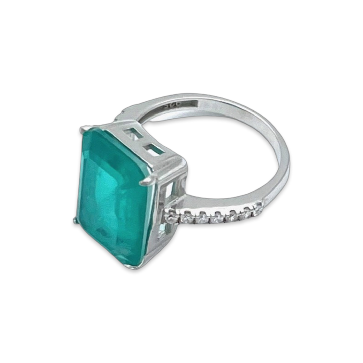 Silver ring with Paraiba and zircons