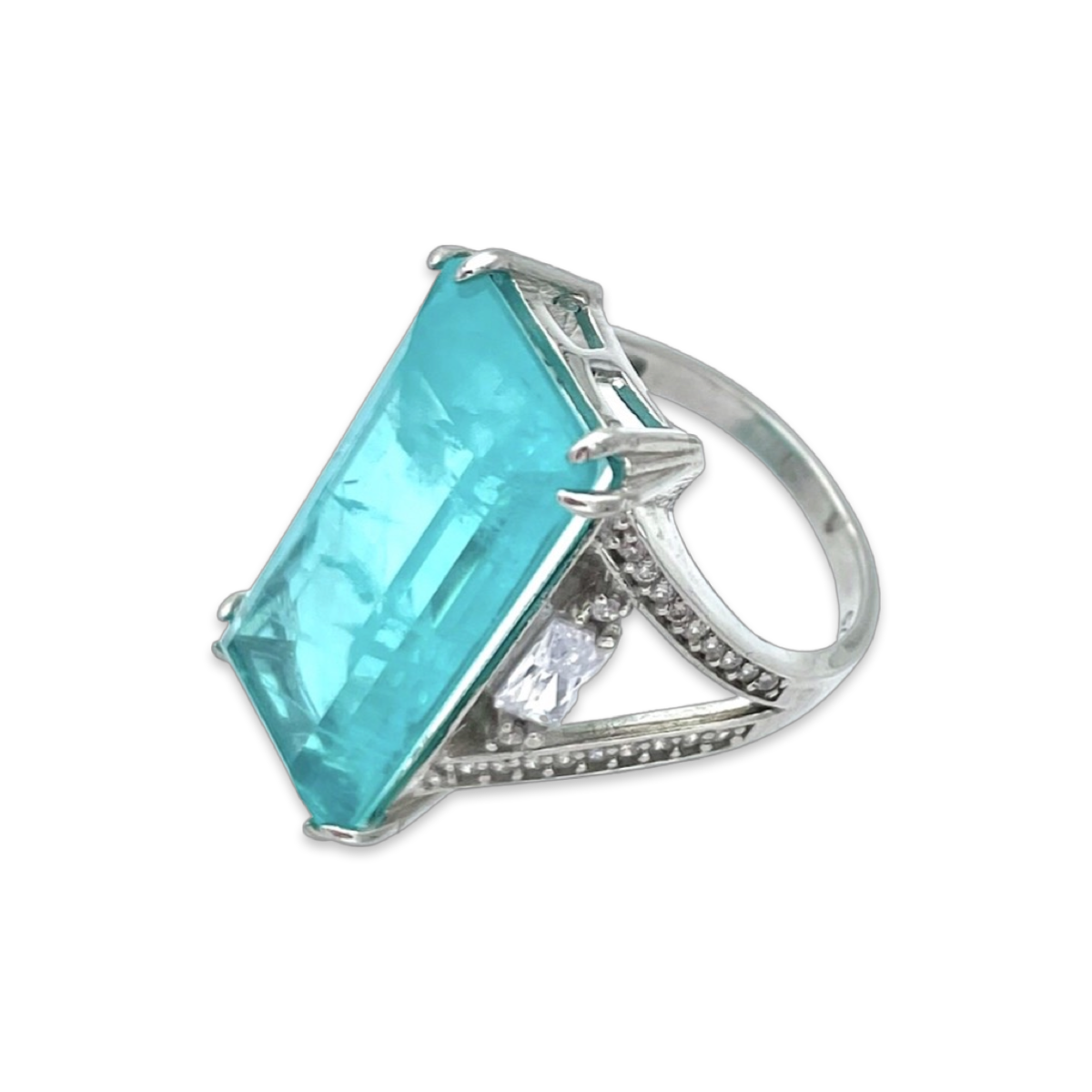 Silver ring with Paraiba and zircons