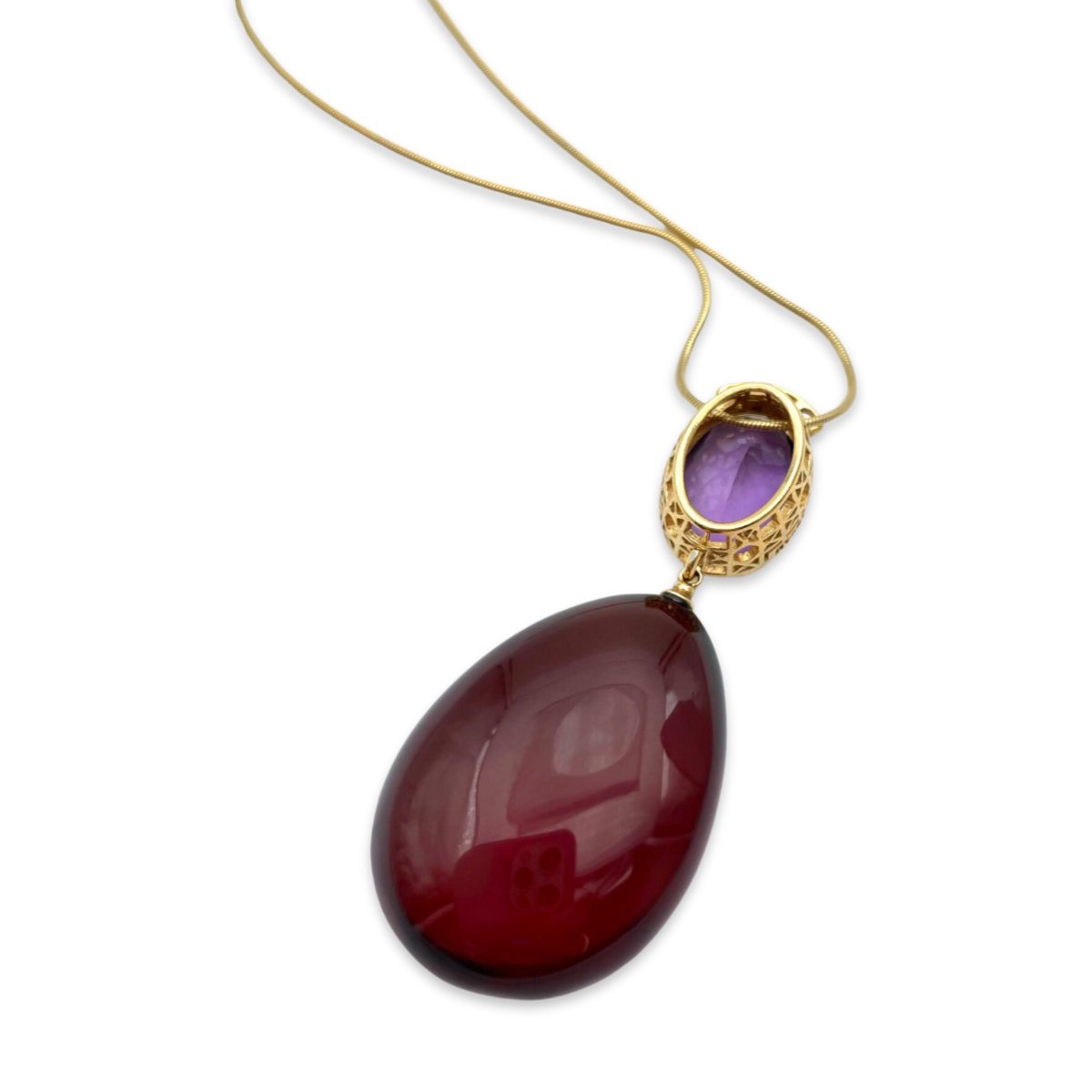 Gold-plated pendant with amber and amethyst