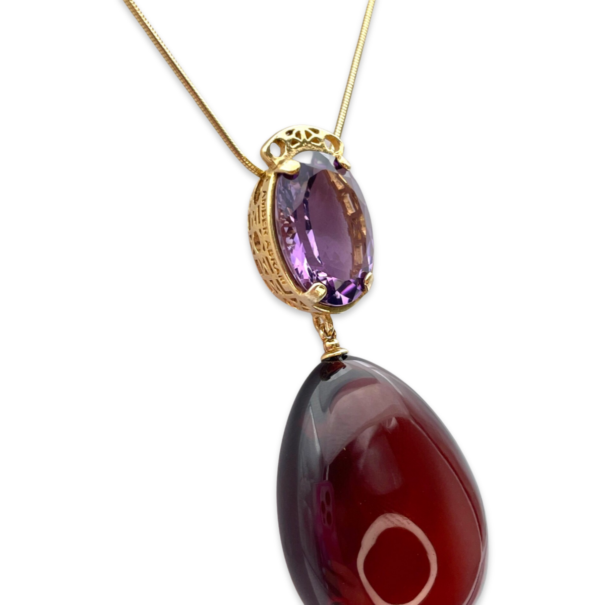 Gold-plated pendant with amber and amethyst