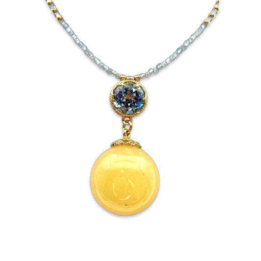 Necklace with amber and topaz