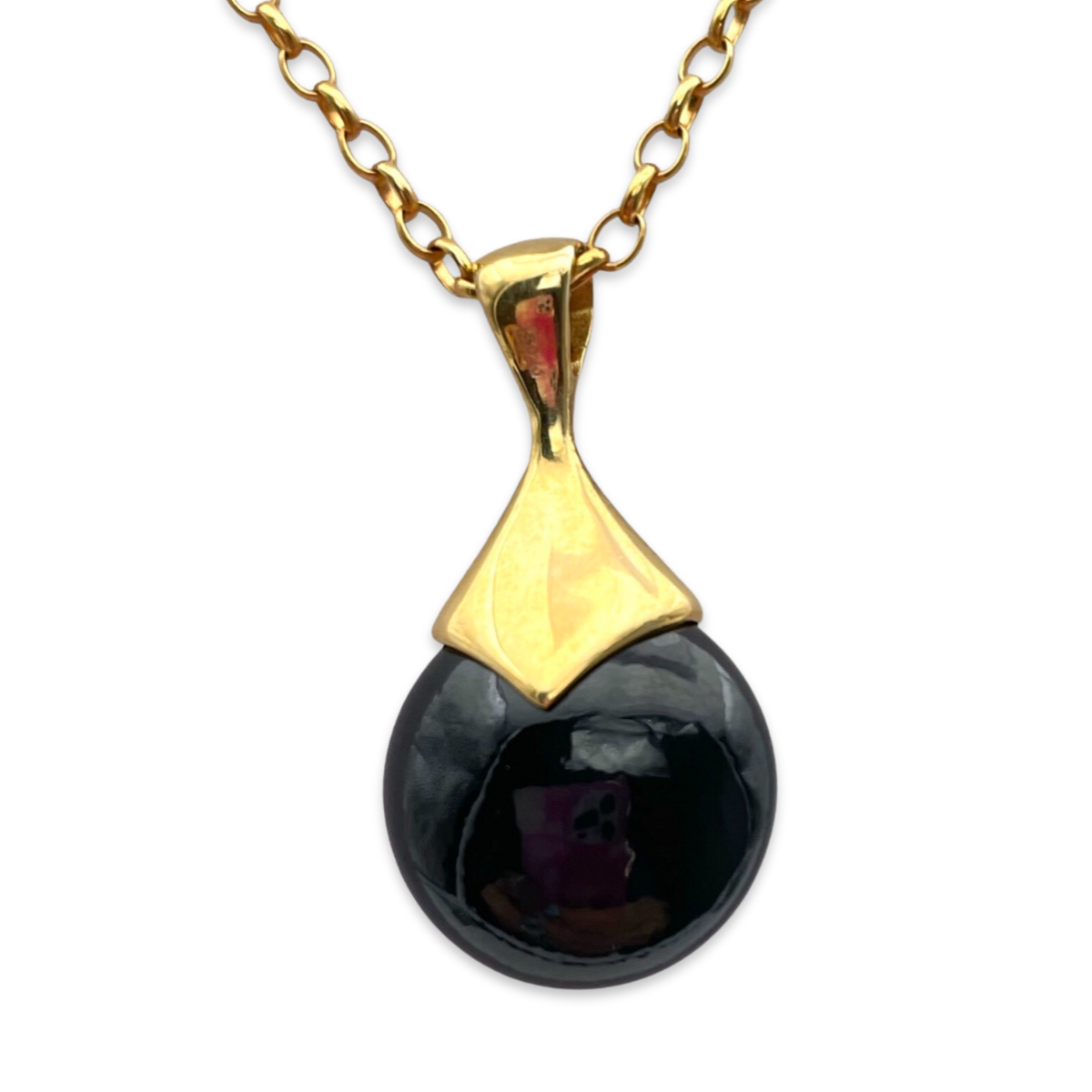 Gilded amber pendant