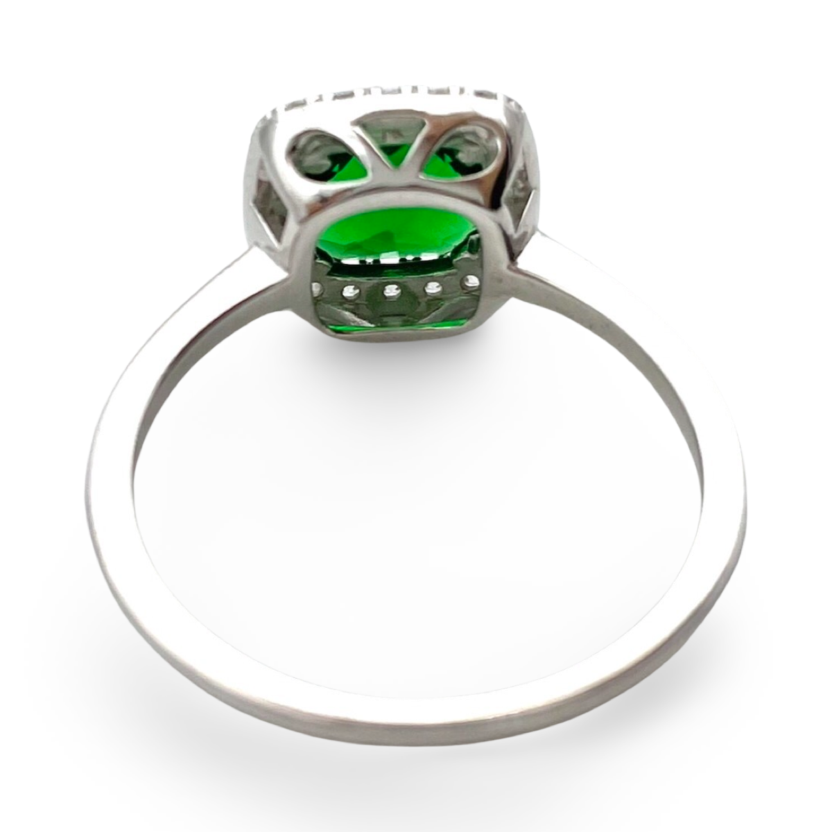 Silver ring with green zircon