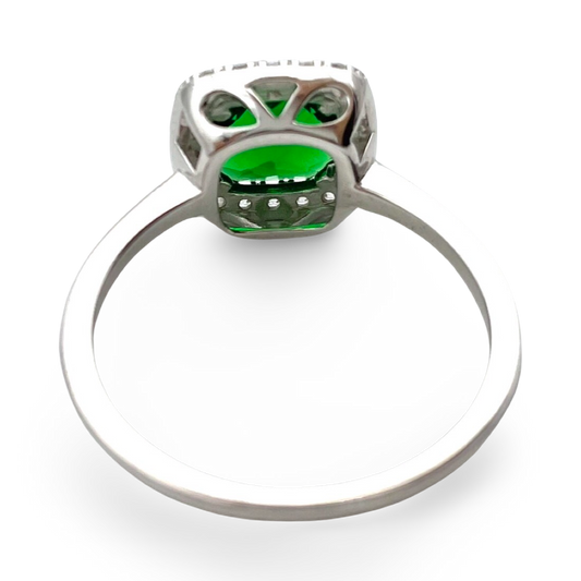 Silver ring with green zircon