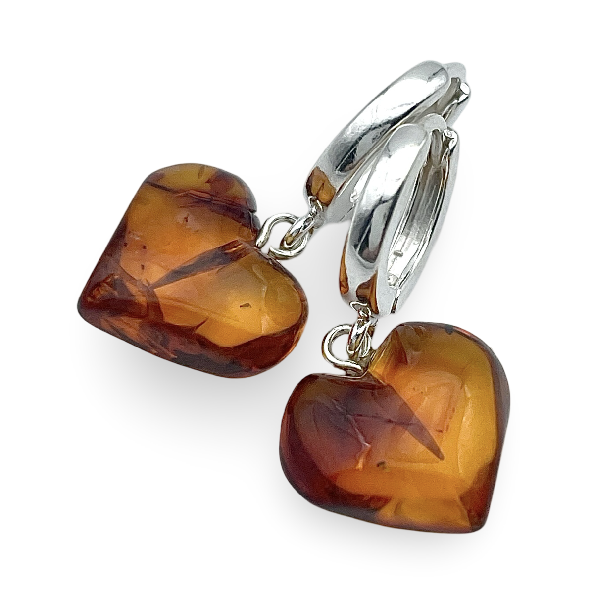 Silver amber earrings «Hearts»