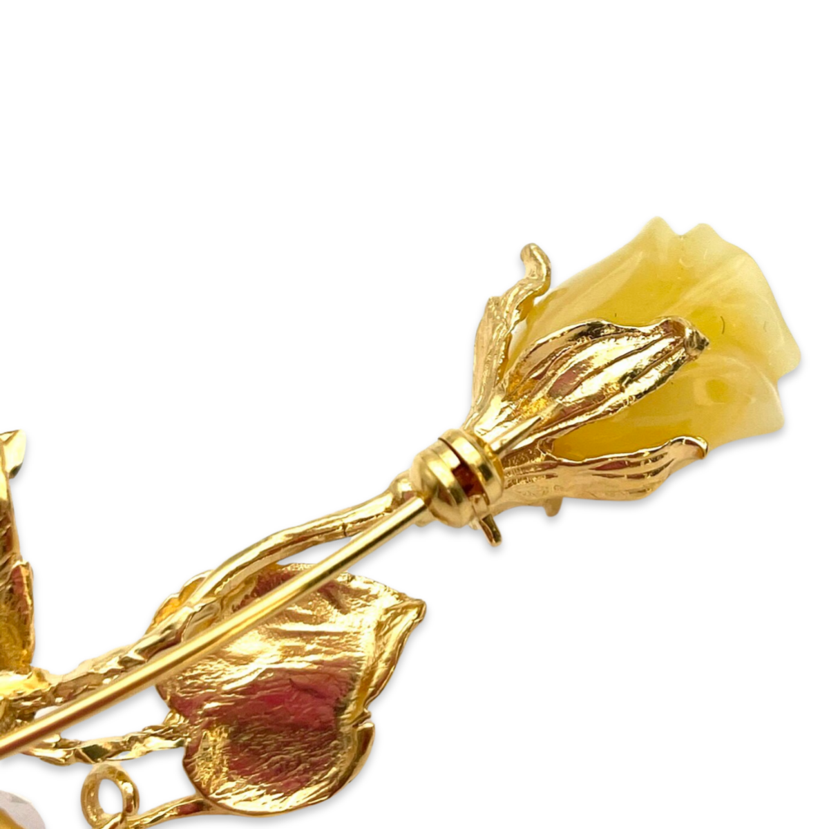 Gold-plated brooch with amber Rose